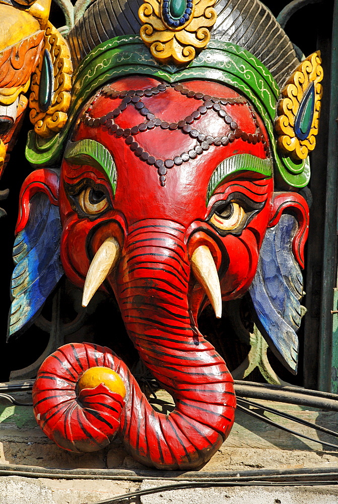 Hinduistic Ganesha, Ganapati, mask, tourist market at Bodhnath, Boudha, Kathmandu, Nepal