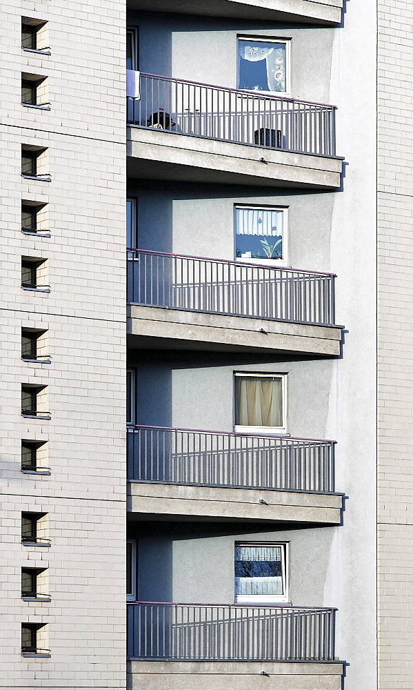 Monotone building facade with balconies, railings and small windows, Tempelhof, Berlin, Germany, Europe