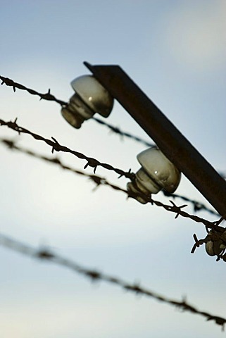 Electric barbed wire at the railings in the concentration camp in Dachau