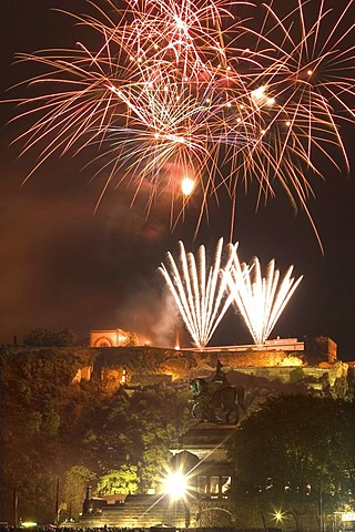 Firework above the fortress Ehrenbreitstein in Koblenz and above the german Corner with the statue of emperor Wilhelm II. Koblenz, Rhineland-Palatinate, Germany