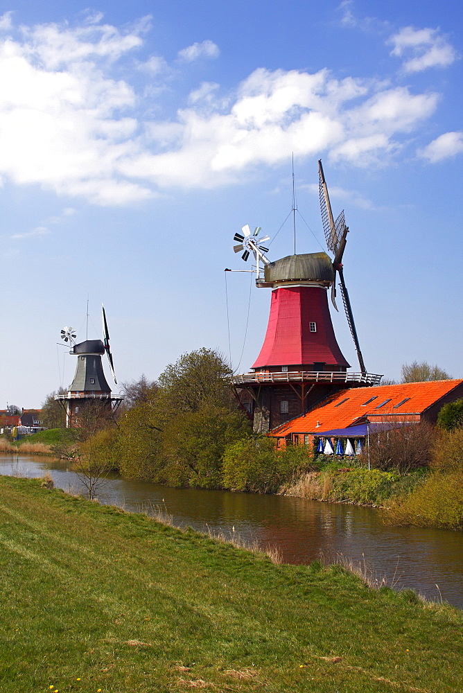 Twin mills in Greetsiel, windmill, built in the style of a two-storey Dutch gallery windmill with a wind rose, Krummhoern Greetsiel, Eastern Frisia, Lower Saxony, Germany, Europe