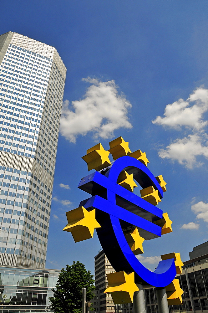 Euro symbol surrounded by stars, in front of a multistory building, Eurotower of the European Central Bank, Frankfurt, Hesse, Germany