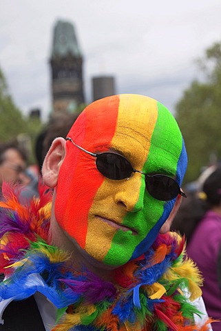 Man's face painted in rainbow colours, on the CSD Christopher Street Day in Berlin on 19 June 2010, Germany, Europe