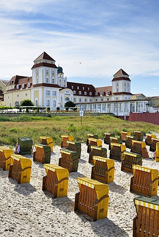 Roofed wicker beach chairs on the beach in front of the Kurhaus spa building, Binz, Mecklenburg-Western Pomerania, Germany