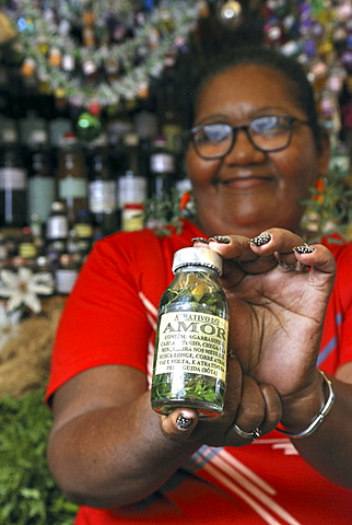 Witch woman selling love essence made of products of the Amazon rainforest, "Ver-O-Peso" market, Belem, Para, Brazil