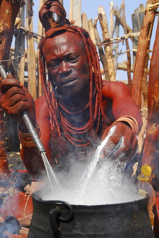 Cooking Himba women, Purros, Kaokoveld, Namibia