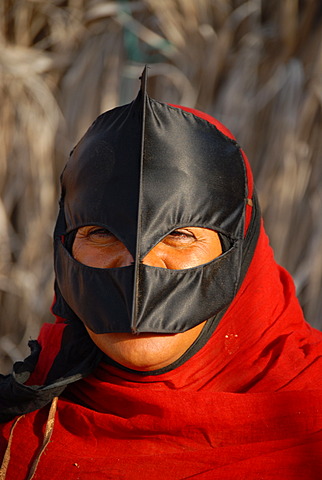 Beduin woman with traditional mask, Wahiba Sands (Wahiba desert), Oman