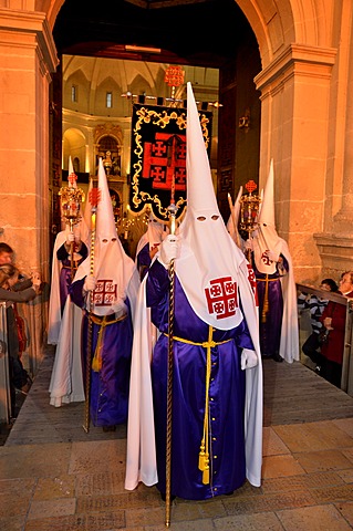 Penitents, Nazarenos, in their typical hooded robes during the festivities of Semana Santa, Holy Week, procession, Good Friday, Alicante, Costa Blanca, Spain, Europe