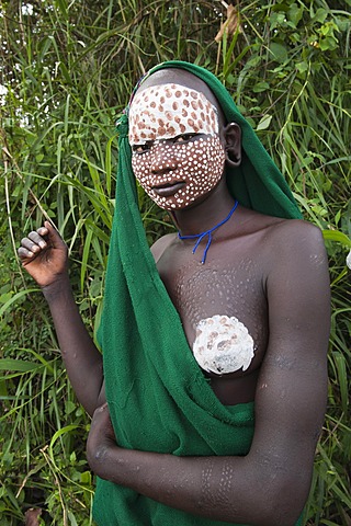 Young Surma woman with traditional body painting, Kibish, Omo valley, Ethiopia, Africa