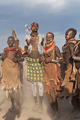 Karo people with body paintings participating in a tribal dance ceremony, Omo river valley, Southern Ethiopia, Africa