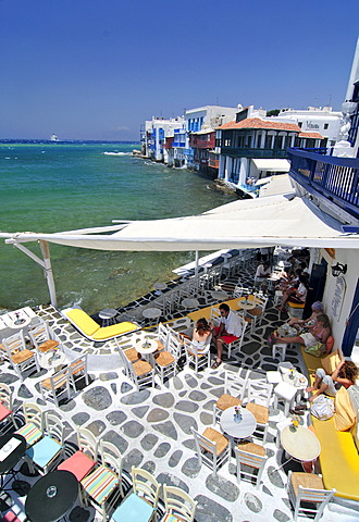 Bar located on the promenade along the port of Little Venice, tessellated stone floor, Mykonos Island, Cyclades, Greece, Europe