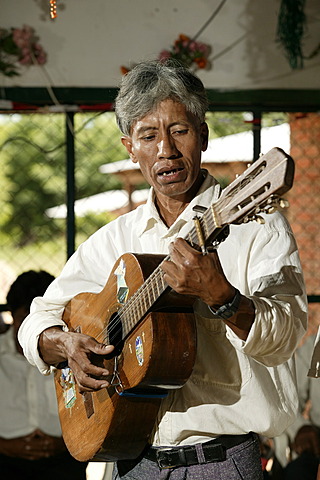 Indian playing guitar, Loma Plata, Chaco, Paraguay, South America