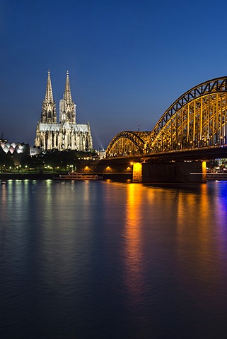 Evening view over the Rhine River towards Museum Ludwig, Cologne Cathedral and Hohenzollern Bridge, UNESCO World Heritage Site, North Rhine-Westphalia, Germany, Europe