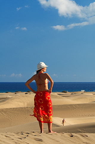 Woman in the sand dunes of Maspalomas, Gran Canaria, Canary Islands, Spain, Europe