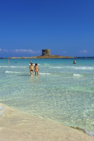 Beach with the Torre della Pelosa tower at back, Sardinia, Italy, Europe