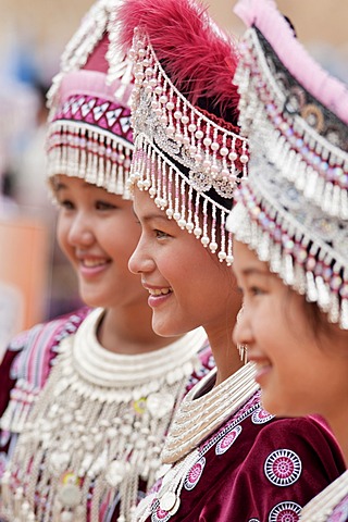 Young Hmong women, traditionally dressed, take part in a new year festival parade at Hung Saew village, Chiang Mai, Thailand, Asia