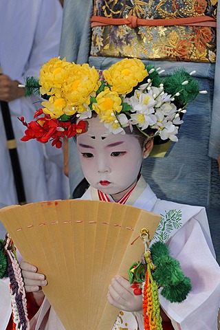 Traditionally dressed and made-up girls at a temple festival, Matsuri Festival, at the Kitano Tenmangu Shrine, Kyoto, Japan, Asia