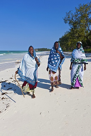 Muslim women on the beach in Zanzibar, Tanzania, Africa