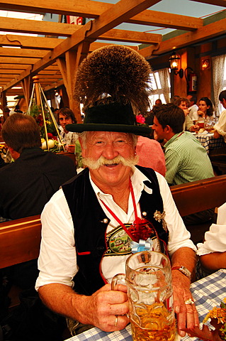 Bavarian man in tradtional costume, Wies\'n, October fest, Munich, Bavaria, Germany, Europe