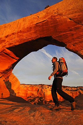 Hiker, Wilson Arch, Moab, Utah, USA