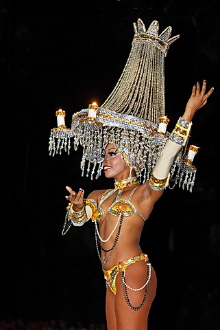 Dancer with an illuminated chandelier on her head, Tropicana open-air nightclub in the suburb of Marianao, La Habana, Havana, Villa San Cristobal de La Habana, Republic of Cuba, Caribbean, Central America