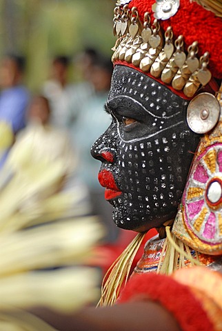 Theyyam performer during a ritual, near Kasargod, North Kerala, South India, Asia