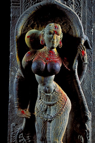 Sculpture of a woman decorated with kumkum powder, entrance of Minakshi, Meenakshi or Sri Meenakshi-Sundareshwara Temple, Madurai, Tamil Nadu, South India, India, Asia