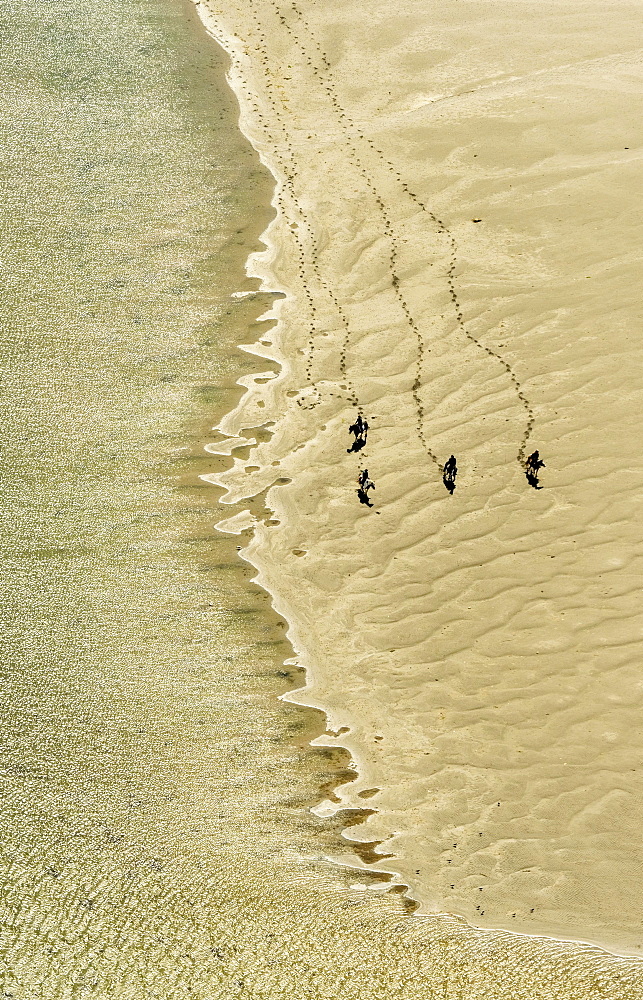 Rusheen Bay, horse riders on sandy beach, Galway, County Clare, Ireland, Europe