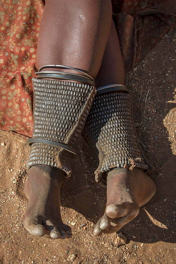 Leg ornamentation and at the same time protection against snake bites in the people of Ovahimba or Himba, Kunene district, Namibia, Africa