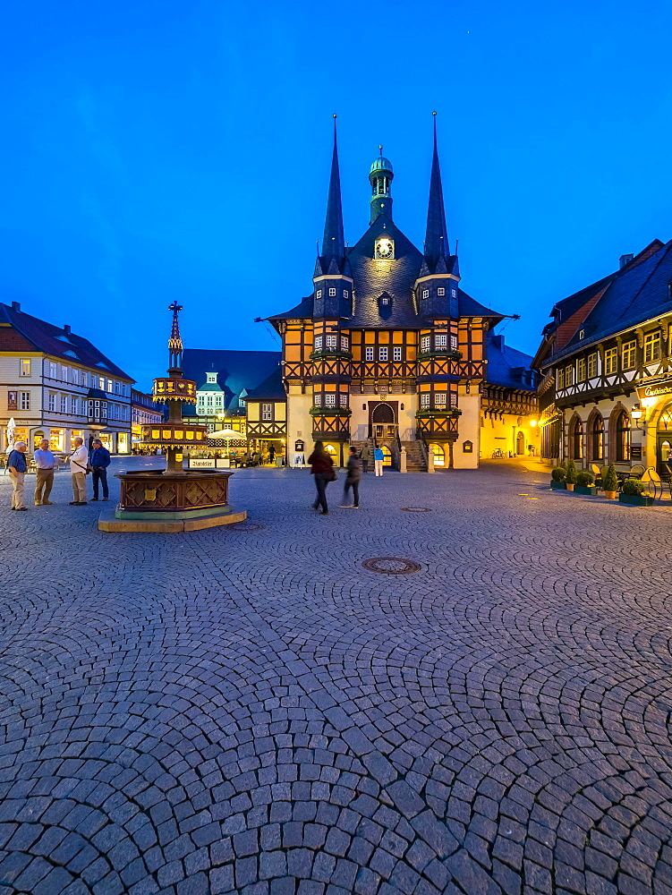 Market Square and Town Hall at dusk, historic centre, half-timbered houses, Wernigerode, Harz, Saxony-Anhalt, Germany, Europe