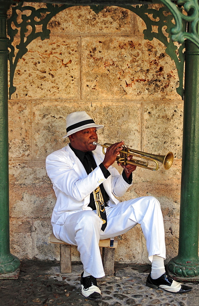 Cuban trumpet player performing in a small park, Havana, Cuba, Central America