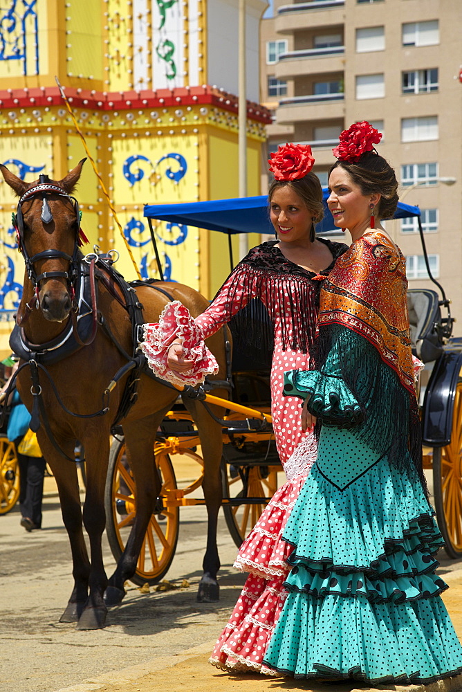 Flamenco dancers at the Feria de Abril, Seville, Andalucia, Spain, Europe