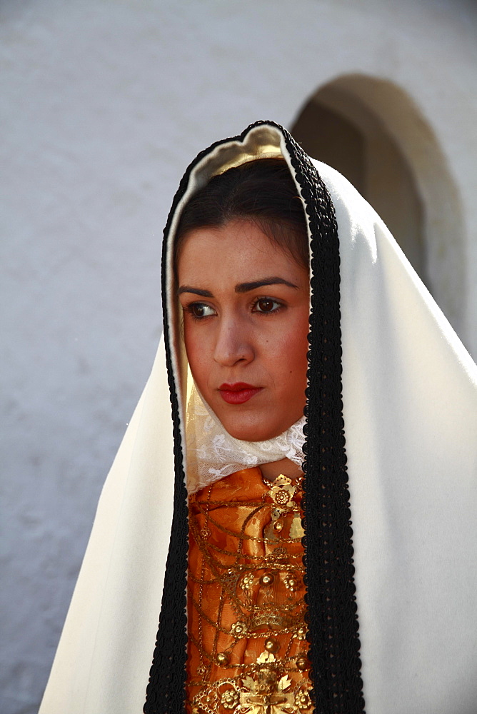 Young woman in traditional costume taking part in a parade, Ibiza, Spain, Europe