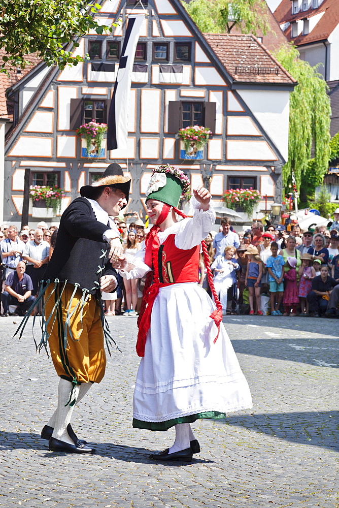 Farmer dancing with a peasant, Fischerstechen or water jousting festival, Ulm, Baden-Wurttemberg, Germany, Europe