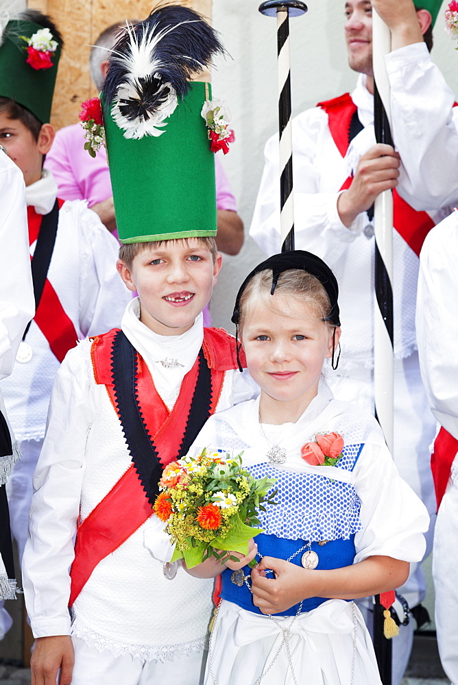 Boy and girl dressed in costume during the parade, Fischerstechen or water jousting festival, Ulm, Baden-Wurttemberg, Germany, Europe