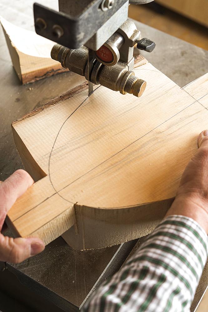 Cutting a wooden block using a band saw, wooden mask carver, Bad Aussee, Styria, Austria, Europe