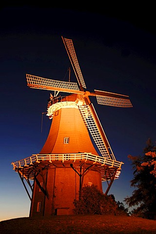 Windmill at night, Dutch gallery type, one of the twin mills of Greetsiel, East Frisia, Lower Saxony, Germany, Europe