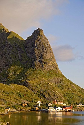 The mountain Reinebringen and the houses of Reine at the coast of the Norwegian Sea, island of Moskenesoy, Moskenesoy, Lofoten archipelago, Nordland, Norway, Europe