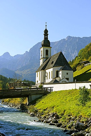 Parish Church of St. Sebastian and Ramsauer Ache River in front of the Reiteralpe Mountains, Berchtesgadener Land, Upper Bavaria, Germany, Europe