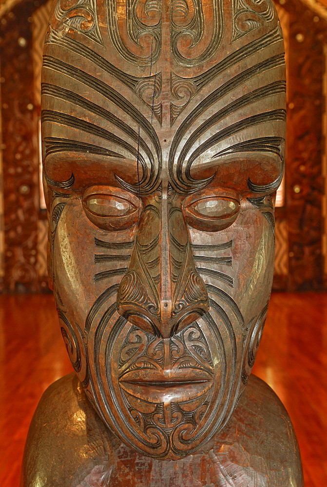 Maori carving, head with tattoo lines, Maori Meeting House, Waitangi Treaty Grounds, Waitangi, North Island, New Zealand