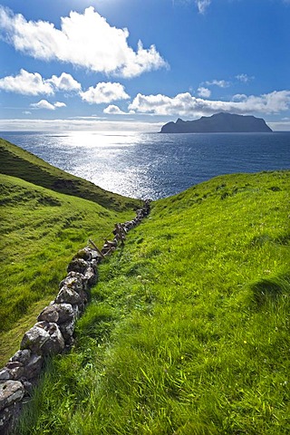 Old stone walls, view towards Mykines Island, Gasadalur, Vagar, Faroe Islands, Denmark, North Atlantic