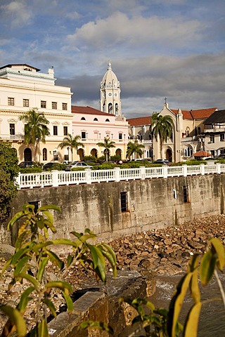 Bell tower of the Iglesia de San Francisco Church and the building of the national theatre, Teatro Nacional, in the Old City, Casco Viejo, Panama City, Panama, Central America