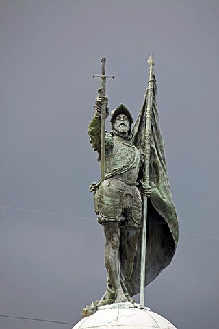 Bronze statue of the explorer Vasco Nunez Balboa standing on a globe, Panama City, Panama, Central America