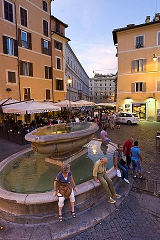 Fountain at the Campo de Fiori, at dusk, view towards the Palazzo Cancelleria, Rome, Italy, Europe