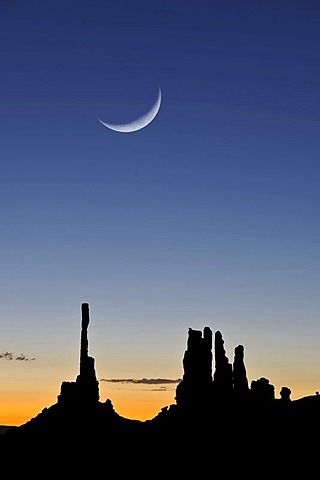 Totem Pole and Yei Bi Chei rock formations, silhouetted before sunrise, dawn, moon, Monument Valley Navajo Tribal Park, Navajo Nation Reservation, Arizona, Utah, United States of America, composite image