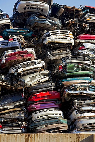 Junk cars crushed and ready for recycling at a scrap yard, Detroit, Michigan, USA