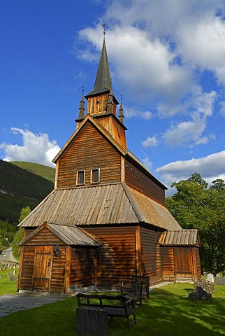 Kaupanger Stave Church against a blue sky with some clouds, Norway, Europe