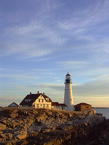 Portland Head Lighthouse illuminated by warm morning light, Cape Elizabeth, Maine, USA