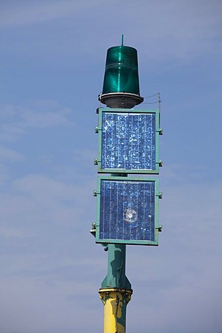 A green lamp and solar panels on a pole, navigation light, aids to navigation, Mi&dzyzdroje beach resort, Misdroy, Wolin Island, Baltic Sea, West Pomeranian Voivodeship, Poland, Europe