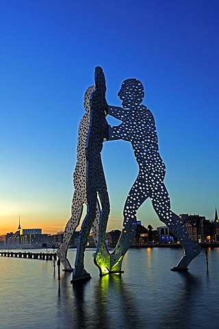 Molecule Men, 30 metre high artwork made of aluminium, sculpted by Jonathan Borofsky, standing in the Spree River, at sunset, Berlin, Germany, Europe, PublicGround